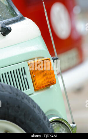 A Volkswagen Camper bus on country road of East Sussex UK. Stock Photo