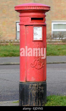 Red postbox. Royal Mail Pillar Box in England, UK. Postbox red. Red letterbox. Red letter box. Stock Photo