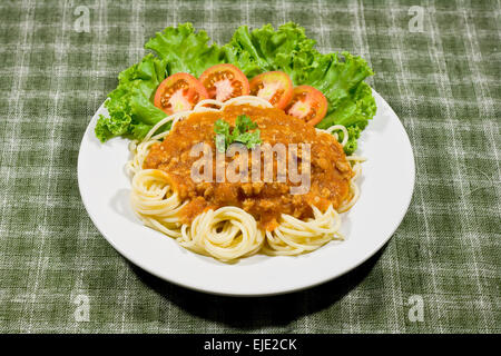 Spaghetti with tomato sauce and persil Stock Photo