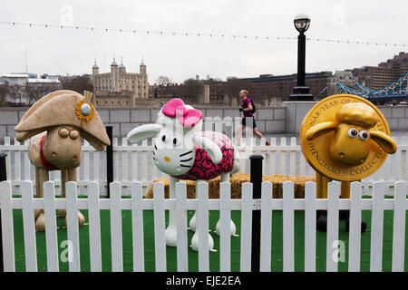 London, UK. 24 March 2015. Sheep designed by artists and celebrities at the  Shaun in the City London launch. Aardman Animations' 'Shaun the Sheep' are set to be dotted around London from Saturday 28th March to form a special arts trail that will benefit thousands of children in hospitals around the UK. The sculptures have been designed by high profile artists, designers and celebrities including David Gandy, Zayn Malik, Zandra Rhodes and Cath Kidston and will be auctioned after the exhibition finishes on 25th May. Photo: Bettina Strenske Stock Photo
