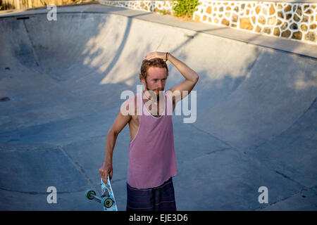 Surf skating in pool near the ocean. Stock Photo