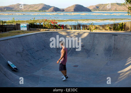 Surf skating in pool near the ocean. Stock Photo