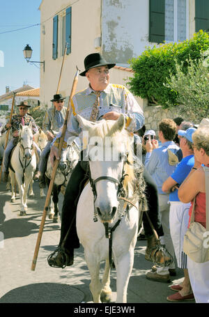 Cabalgata Riders Horses and riders parade through the streets of David, Panama, in the ...