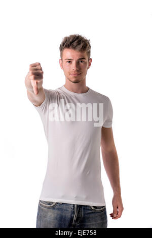 Handsome blond young man doing thumb down sign, isolated on white Stock Photo