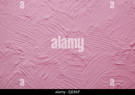pink wall with plaster relief abstract drawing Stock Photo