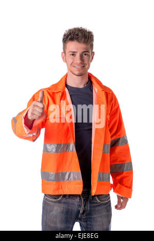 Smiling young construction or road worker doing thumb up sign, isolated on white Stock Photo