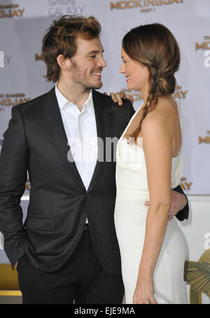 LOS ANGELES, CA - NOVEMBER 17, 2014: Sam Claflin & wife Laura Haddock at the Los Angeles premiere of his movie 'The Hunger Games: Mockingjay Part One' at the Nokia Theatre LA Live. Stock Photo