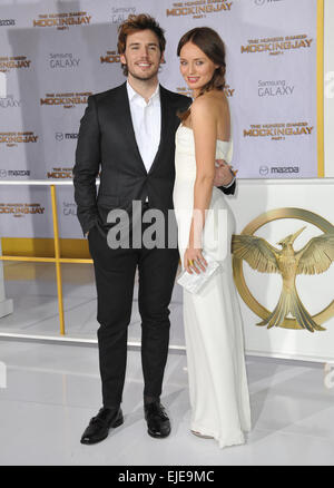 LOS ANGELES, CA - NOVEMBER 17, 2014: Sam Claflin & wife Laura Haddock at the Los Angeles premiere of his movie 'The Hunger Games: Mockingjay Part One' at the Nokia Theatre LA Live. Stock Photo