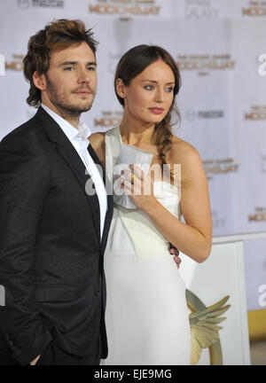 LOS ANGELES, CA - NOVEMBER 17, 2014: Sam Claflin & wife Laura Haddock at the Los Angeles premiere of his movie 'The Hunger Games: Mockingjay Part One' at the Nokia Theatre LA Live. Stock Photo