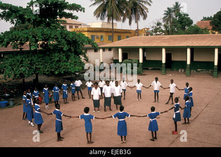 Pupils forming a circle outside a Catholic church school in Gambia, West Africa Stock Photo