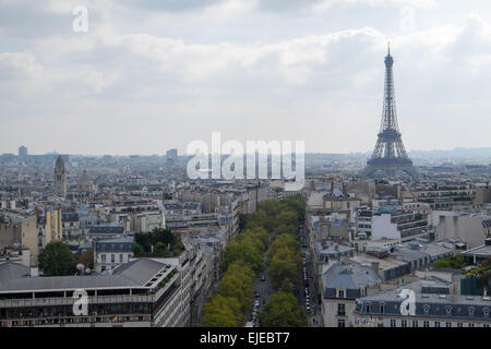 In a view from atop the Arc du Triomphe, the famous Eiffel Tower rises above Paris, France on a lovely fall afternoon. Stock Photo