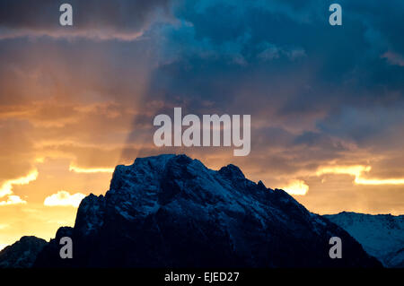 sunset behind Teton Mountains in Grand Teton National Park Stock Photo