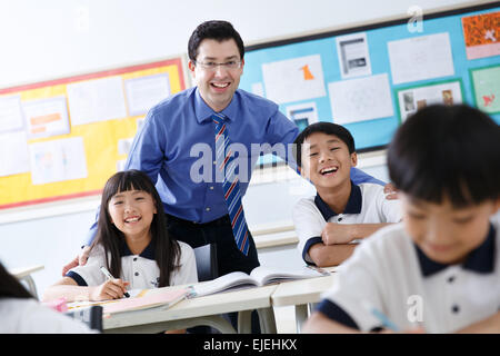 Teachers and students in the classroom Stock Photo