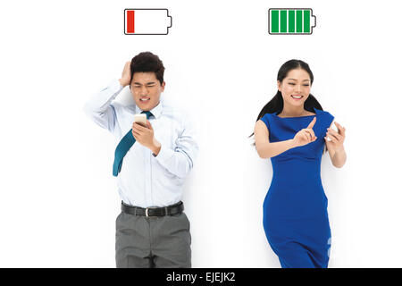Creative business man and a woman holding a mobile phone Stock Photo