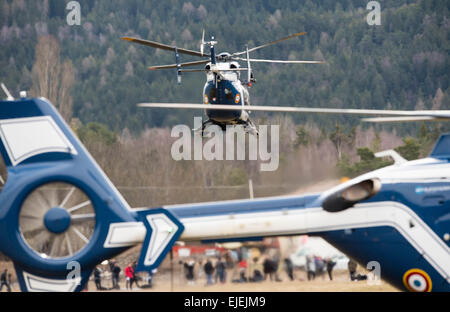 Seyne Les Alpes, France. 25th Mar, 2015. Helicopters of the French Gendarmerie take off for the site where a Germanwings aircraft crashed in the French Alps in Seyne Les Alpes, France, 25 March 2015. Photo: PETER KNEFFEL/dpa/Alamy Live News Stock Photo