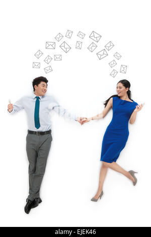 Creative business man and a woman holding a mobile phone Stock Photo