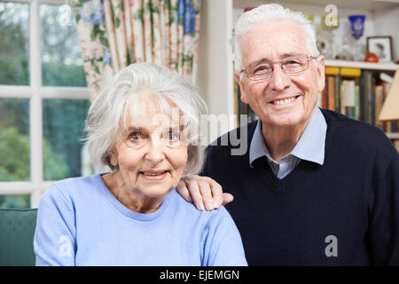 Portrait Of Happy Senior Couple At Home Together Stock Photo
