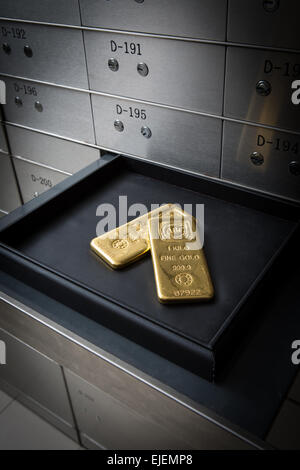 A room full of safety deposit boxes in a bank vault Stock Photo