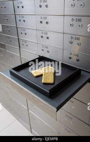 A room full of safety deposit boxes in a bank vault Stock Photo