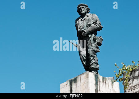 A 22 foot bronze statue of Ernesto Che Guevara stands above the Ernesto Guevara Sculptural Complex in Santa Clara. Beneath it stands the Che Guevara Mausoleum housing the remains of executed Marxist revolutionary Ernesto Che Guevara and twenty-nine of his fellow combatants killed in 1967 during Guevara's attempt to spur an armed uprising in Bolivia. Stock Photo