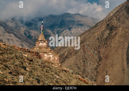 Old shrine in scenic Himalayas mountains in Nepal Stock Photo