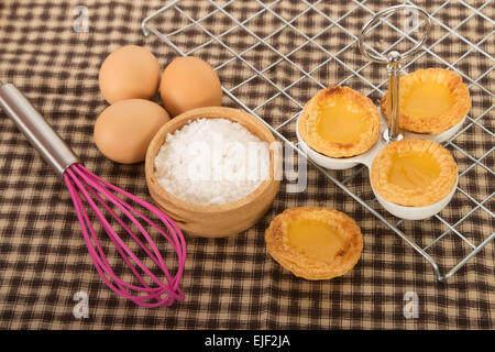 Baked egg tart on tray Stock Photo