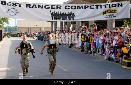 Master Sgt. Eric Ross left and Master Sgt. Eric Turk, representing the Army Special Forces Command, finish the last run as winners of the 2010 Best Ranger Competition at Fort Benning, Ga. Photo credit: Daren Reehl.    2010 Best Ranger Competition  /ranger/2010/ Stock Photo