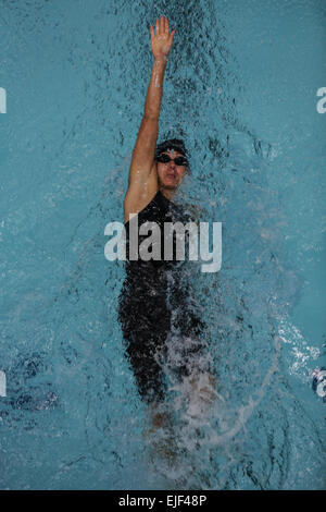 U.S. Army 1st. Lt. Kelly Elmlinger, Warrior Transition Battalion, Fort Sam Houston, Texas, swims a preliminary race during the 2014 Warrior Games at the U.S. Olympic Training Center in Colorado Springs, Colo., Sept. 30, 2014. More than 200 wounded, ill and injured service members and veterans participated in the 2014 Warrior Games, an annual event featuring Paralympic-style competitions.    Spc. Ronda Robb Stock Photo