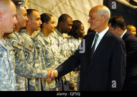 20080526-A-2845D-1 309 - U.S. Department of Homeland Security Secretary Michael Chertoff shakes the hand of a Soldier May 26, congratulating him on his new U.S. citizenship at a ceremony on Bagram Air Field. Forty-four Soldiers and Marines were granted citizenship at a naturalization ceremony because of their military service. Army photo by Stock Photo