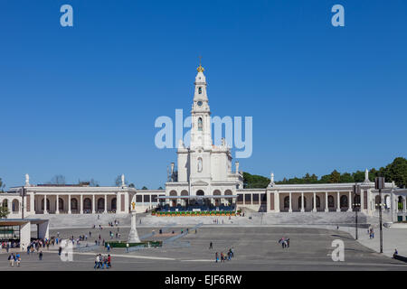 Sanctuary of Fatima, Portugal, March 07, 2015 - Basilica of Our Lady of the Rosary, the Sacred Heart of Jesus Monument and colon Stock Photo