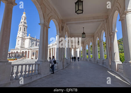 Sanctuary of Fatima Shrine, Portugal. Basilica of Our Lady of the Rosary seen through the colonnade. Basilica de Nossa Senhora do Rosario Stock Photo