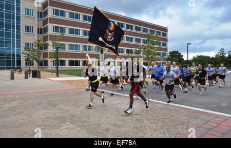 U.S. Army Training and Doctrine Command Soldiers, civilians, family members and friends joined in a 2.5 mile fun run and walk this morning led by TRADOC's Command Sgt. Maj. Daniel Dailey to celebrate the Army's 237th Birthday. &quot;It the run was a good start for the Army Birthday. We have to remember the millions that were here before us and to honor them. They all decided to risk their lives and serve. Most Americans don't think like this. They don't have to; we take care of that. We serve so they don't have to worry,&quot; said Dailey following the event.  Sgt. 1st Class Kelly Jo Bridgwate Stock Photo