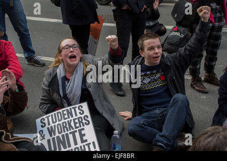 London, UK.  25th March, 2015. Students, education workers and supporters marched from London School of Economics (LSE) to the London College of Communication (LCC) in Elephant and Castle, under the banner of ‘March to stop the cuts at UAL: free education for all’ The demonstration is aimed primarily at protesting a series of devastating cuts to Foundation courses at UAL, but is also themed around a broader fight for free and democratic education. The march will demand that the cuts are cancelled, Credit:  Paul Mendoza/Alamy Live News Stock Photo