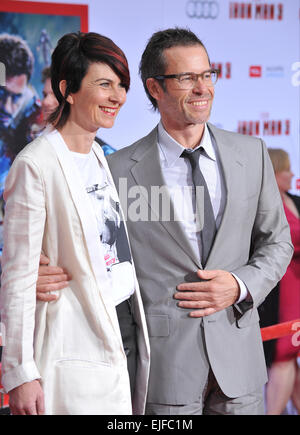 LOS ANGELES, CA - APRIL 24, 2013: Guy Pearce & wife Kate Mestitz at the Los Angeles premiere of his movie 'Iron Man 3' at the El Capitan Theatre, Hollywood. Stock Photo