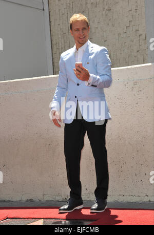 LOS ANGELES, CA - APRIL 22, 2013: Backstreet Boys star Brian Littrell on Hollywood Boulevard where they were honored with the 2,495th star on the Hollywood Walk of Fame. Stock Photo