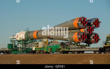 The Soyuz TMA-16M spacecraft is rolled out by train to the launch pad at the Baikonur Cosmodrome March 25, 2015 in Kazakhstan. Launch of the Soyuz rocket is scheduled for March 28 and will carry Expedition 43 crew to the International Space Station. Stock Photo