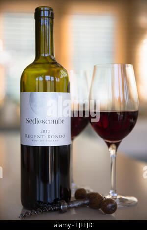 English wine in glass and corkscrew - Bottle of red wine Regent Rondo,vfrom Sedlescombe Vineyard, Kent, Stock Photo