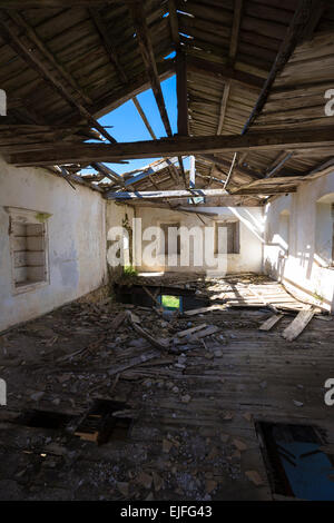 Wooden beams in derelict abandoned house ruin in ancient village of Old Perithia - Palea Peritheia, Corfu, Greece Stock Photo