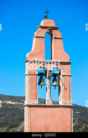 Church bells in bell tower of Saint Iakovos Persis belltower in ancient village Old Perithia - Palea Peritheia, Corfu, Greece Stock Photo