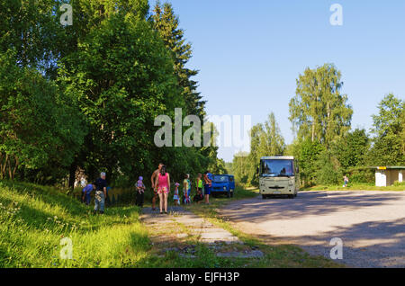 Rural landscape - regular bus in the village. Stock Photo