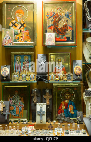 Religious icons of Greek Orthodox christianity on sale in a gifts and souvenirs shop in Kerkyra, Corfu Town, Greece Stock Photo