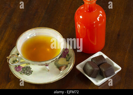 Tea served with chocolate truffles and aroma therapy Stock Photo