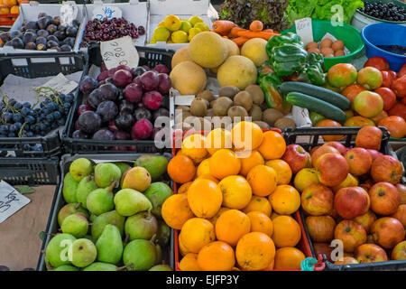 Various fruits for sale at a market Stock Photo