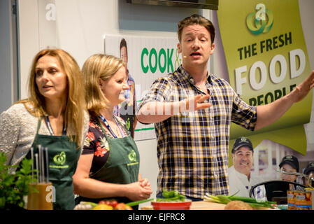 Sydney, Australia. 26th March, 2015. Fresh food campaigner Jamie Oliver cooked up a storm of pan-cooked giant prawns with snow peas on the opening day of the Sydney Royal Easter Show. Credit:  MediaServicesAP/Alamy Live News Stock Photo