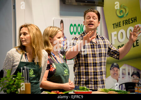 Sydney, Australia. 26th March, 2015. Fresh food campaigner Jamie Oliver cooked up a storm of pan-cooked giant prawns with snow peas on the opening day of the Sydney Royal Easter Show. Credit:  MediaServicesAP/Alamy Live News Stock Photo