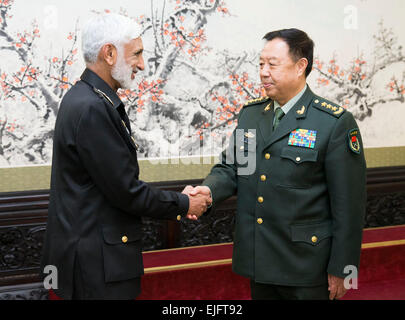 Beijing, China. 26th Mar, 2015. Vice Chairman of China's Central Military Commission Fan Changlong (R) meets with the Chief of Naval Staff of Pakistan Muhammad Zakaullah in Beijng, capital of China, March 26, 2015. © Huang Jingwen/Xinhua/Alamy Live News Stock Photo