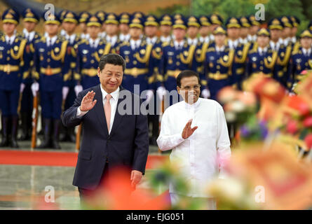 Beijing, China. 26th Mar, 2015. Chinese President Xi Jinping (L) holds a welcoming ceremony for Sri Lankan President Maithripala Sirisena before their talks in Beijing, capital of China, March 26, 2015. Credit:  Xie Huanchi/Xinhua/Alamy Live News Stock Photo