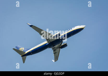 Ryanair plane in flight against cloudy sky Stock Photo - Alamy