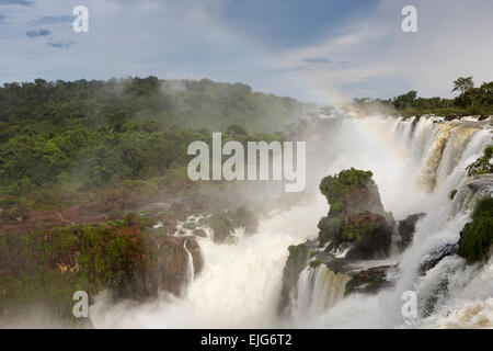 Argentina, Iguazu Falls, panoramic rainbow over waterfalls from Salto Bernabe Mendez Stock Photo