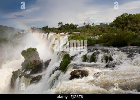 Argentina, Iguazu Falls, rainbow over waterfalls from Salto Bernabe Mendez Stock Photo
